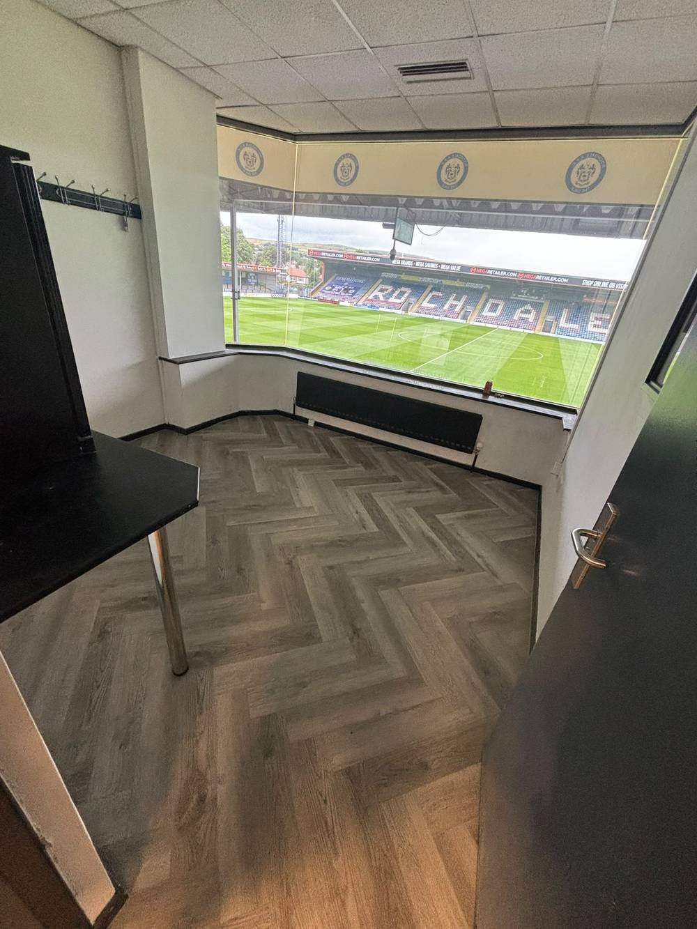 Herringbone flooring fitted in an executive stadium hospitality box