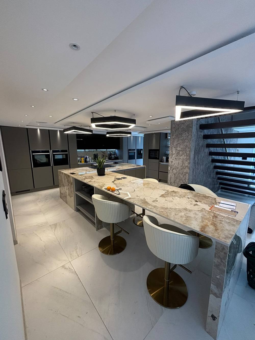 Kitchen island seating area with marble worktop