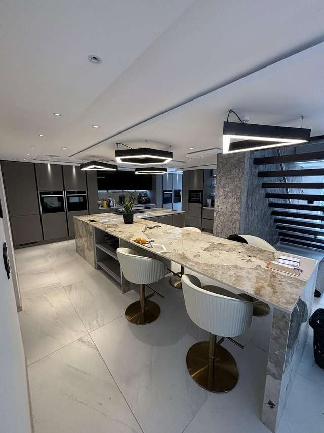 Luxury fitted kitchen with marble island
