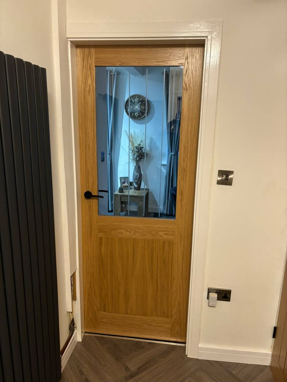 Oak stable-style door with a glazed upper panel